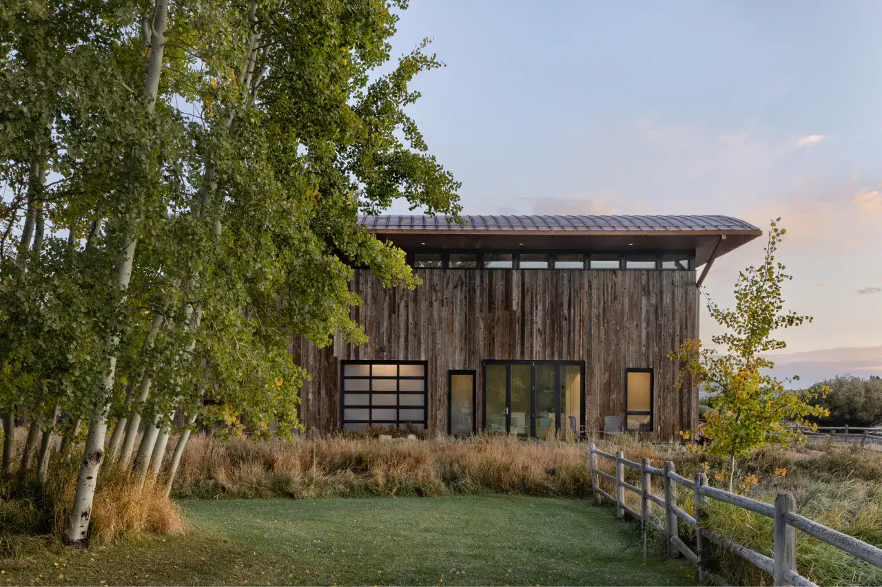 crescent-barn-trees-fence